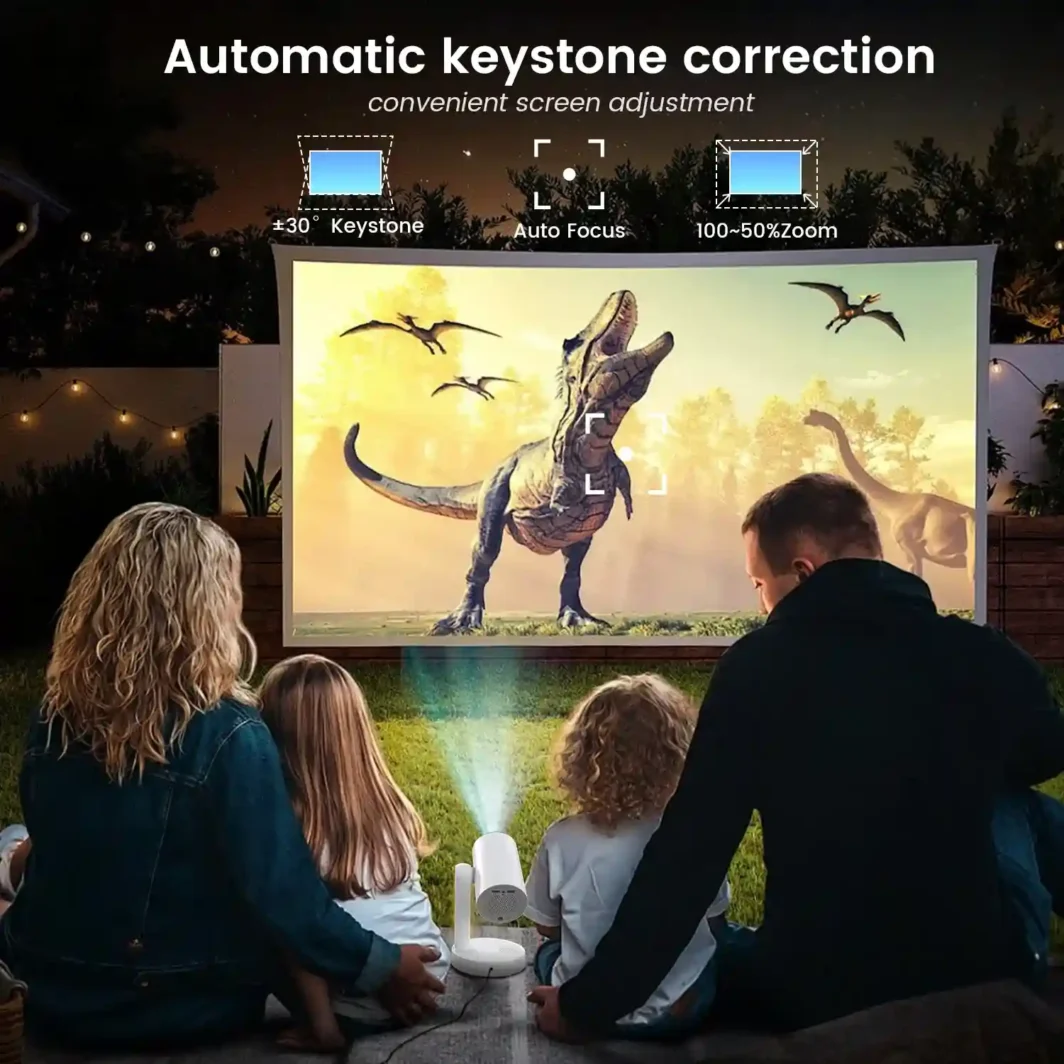 Portable film projector with auto-focus and keystone correction